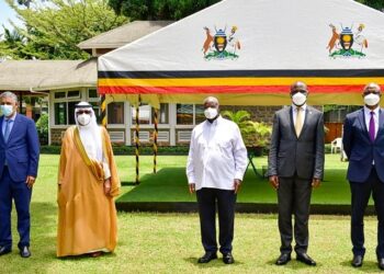 President Museveni poses for a photo with Dr. Fahad Abdullah Al- Dossari (2nd L) Chairman of Board of Directors of BADEA and other officials