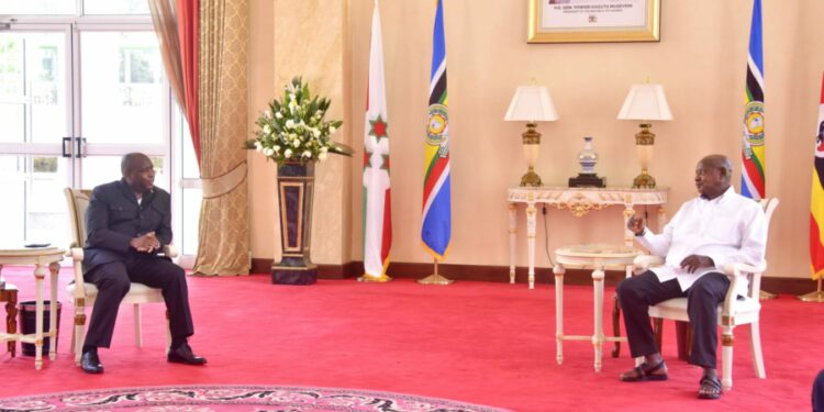 President Yoweri Museveni with his Burundi counterpart Evariste Ndayishimye during a meeting