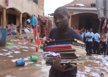 Student saving his books