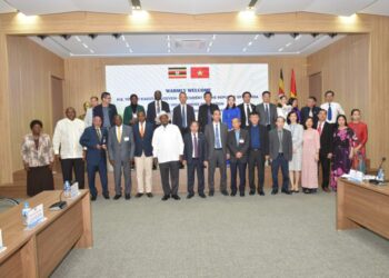 President Yoweri Museveni  in a group photo after a meeting with staff at the Vietnam Academy of Agricultural Sciences in Hanoi, Vietnam on 25th November 2022. Photo by PPU/Tony Rujuta.