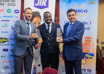 Dembe Group Managing Director, Adim Damani, Emmanuel Turyazooka Sales Manager Reckitt Uganda, and CEO of Dembe Group, Anil Damani pose with the award during the event.