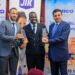 Dembe Group Managing Director, Adim Damani, Emmanuel Turyazooka Sales Manager Reckitt Uganda, and CEO of Dembe Group, Anil Damani pose with the award during the event.