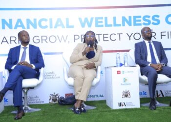 Panelist Gloria Wakooba (centre) Bank of Uganda's Director for Administration emphasizes a point as other panelists Tonny Mudoola (left) UAP Old Mutual Life Acting CEO and Andrew Kabeera (right) ED Post Bank Uganda follow closely during the Financial Wellness Class webinar held recently at UAP Business park