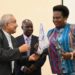 Minister Amongi receives her award from Prof. Syed Abidi of Makerere University