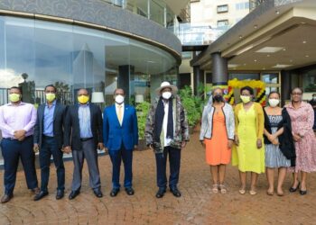 Uganda's President, Yoweri Kaguta Museveni (centre), together with Dr. Patrick Bitature (4th left); Dr. Nataliey Bitature the Simba Group, Chief of Staff and other Group executives and directors at the official launch of the Naguru-based Protea Hotel Kampala Skyz on 30th September 2022.