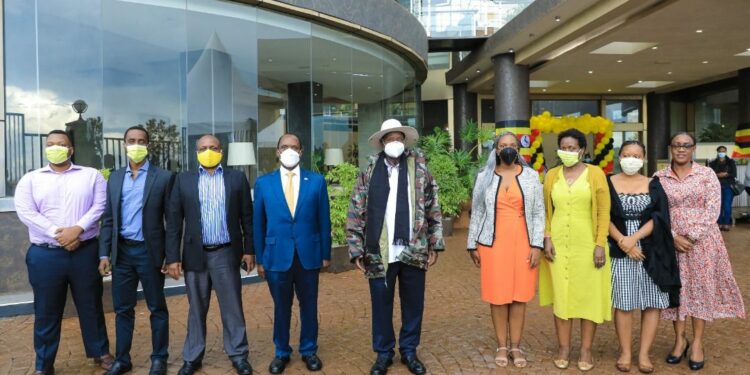 Uganda's President, Yoweri Kaguta Museveni (centre), together with Dr. Patrick Bitature (4th left); Dr. Nataliey Bitature the Simba Group, Chief of Staff and other Group executives and directors at the official launch of the Naguru-based Protea Hotel Kampala Skyz on 30th September 2022.