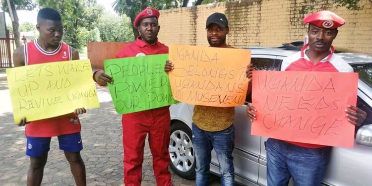 L-R: Rashid Kezimbira, Saabwe Alosious, Kagolo James and Fred Binayomba demonstrating in Johannesburg, in 2020.