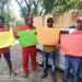 L-R: Rashid Kezimbira, Saabwe Alosious, Kagolo James and Fred Binayomba demonstrating in Johannesburg, in 2020.