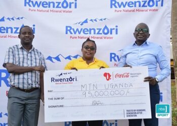 Innocent Obong, Quality Assurance Manager Rwenzori, Barbra Kiwanuka, Events & Sponsorship Manager at MTN and Isaac Ssekasi, Commercialization Director Coca-Cola Beverages Africa during the sponsorship handover at Namanve