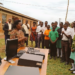 Hon. Mary Begumisa while handing over computers to students and teachers of Mateete seed school secondary