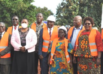 Minister Babalanda with board members of Maganjo Grain Millers Ltd