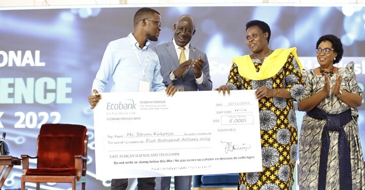 Uganda’s EAC Presidential Innovative Award winner Steven Kakooza receives his award from Uganda’s Vice President Jessica Alupo for his innovation Kawu Smart Card at the East African Youth Innovation Forum held in Kololo, Kampala.