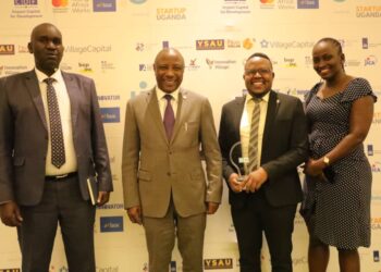 L-R- URSB Deputy Registrar General, Alex Anganya, State Minister for National Guidance at the Ministry of ICT and National Guidance, Hon. Kabbyanga Godfrey Baluku, Steven Baryevuga & Provia Nangobi in a group picture during the award ceremony