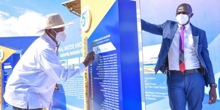 President Yoweri Museveni signs the National Water and Sewerage Corporation (NWSC) completed projects Inaugurated during the NWSC 50 years celebrations at Kololo Ceremonial Grounds on 2nd December 2022. Photo by PPU/ Tony Rujuta.