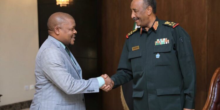 Gen. Al Burhan welcomes Ambassador Ssemuddu to the meeting convened at the Presidential Palace in 
Khartoum, Republic of Sudan on the side-lines of the 48th IGAD Council of Ministers’ meeting. Courtesy photo