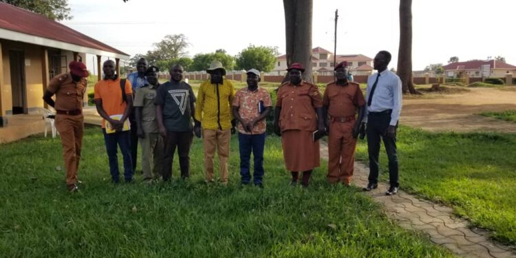 Alebtong security team headed by RDC Robert Adiama in a group photo