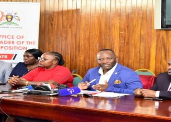 The Leader of the Opposition, Hon. Mathias Mpuuga (5th, left) and his members at the press conference