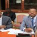 State Minister for Planning, Amos Lugoloobi (right) and the Permanent Secretary/ Secretary to the Treasury, Ramathan Ggoobi, appearing before the House Committee on Finance on Thursday 1 December 2022