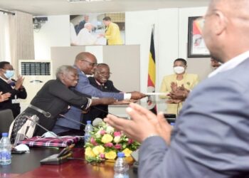 Speaker Anita Among (far-right) receiving the petition for a palliative care policy from the Palliative Care Association of Uganda