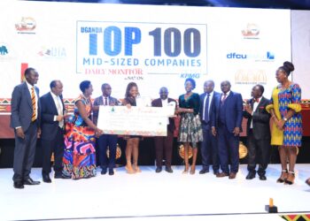 Winners pose with the invited guests at teh Top 100 Gala Dinner