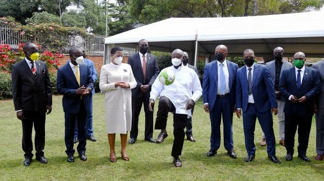 H.E Yoweri Kaguta Museveni juggles the ball during the visit of CAF President Dr. Patrice Motsepe.