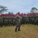 Gen. Kavuma while chanting with military Police officers