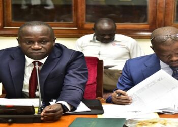 Sports Minister, Hon. Ogwang (L) and Magogo appearing before the committee