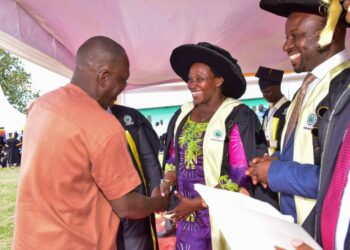 The State House Comptroller Jane Barekye (second left) being congratulated by the Member of Parliament form Kilak South of the FDC Party Olanya Gilbert (left) in the presence of the Director of Industrial Hubs and Presidential Projects at State House, Eng. Raymond Kamugisha (right) for the good work President Yoweri Museveni has done this was during the 1st graduation of the Presidential Initiative for Zonal Industrial Parks for Skills Development, Value Addition and Wealth creation at the Acholi Zonal Industrial Hub in Gulu district, Aswa County, Unyama Sub-county, Oding Village on 3rd January 2023. Photo by PPU / Tony Rujuta.
