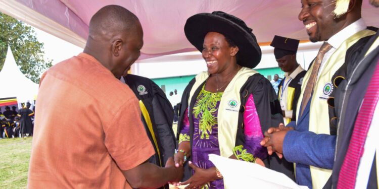 The State House Comptroller Jane Barekye (second left) being congratulated by the Member of Parliament form Kilak South of the FDC Party Olanya Gilbert (left) in the presence of the Director of Industrial Hubs and Presidential Projects at State House, Eng. Raymond Kamugisha (right) for the good work President Yoweri Museveni has done this was during the 1st graduation of the Presidential Initiative for Zonal Industrial Parks for Skills Development, Value Addition and Wealth creation at the Acholi Zonal Industrial Hub in Gulu district, Aswa County, Unyama Sub-county, Oding Village on 3rd January 2023. Photo by PPU / Tony Rujuta.