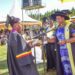 The State House Comptroller Jane Barekye (right) giving certificates to the best graduates during the First Cohort graduation ceremony at the Bunyoro Industrial Hub in Myeeba Nyakaronga Village, Kimengo Sub-county, Masindi District on 5th January 2022. Photo by PPU/ Tony Rujuta.