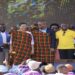 Speaker Anita Among (holding yellow microphone) at the event in Ngariam. On her left is Hon. Moses Magogo and Hon. Peter Ogwang