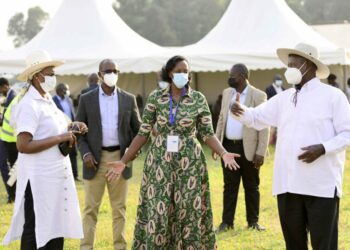 L-R: First Lady Janet Museveni,  Pastor Patience Rwabwogo and President Yoweri Museveni