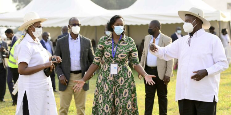 L-R: First Lady Janet Museveni,  Pastor Patience Rwabwogo and President Yoweri Museveni