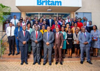 Managing Director of Britam Group Mr Tom Gitogo (third from left)