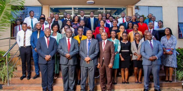 Managing Director of Britam Group Mr Tom Gitogo (third from left)