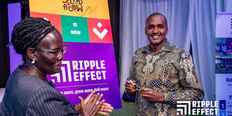 Minister Frank Tumwebaze launches the new name. Looking on is Peninah Kasule, the Board Chair of Ripple Effect