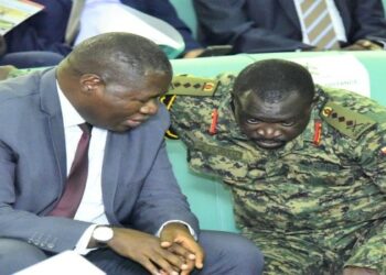 Minister Oboth (L) and Lt Gen. Peter Elwelu, the Deputy Chief of Defence Forces, during the Wednesday session