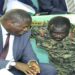 Minister Oboth (L) and Lt Gen. Peter Elwelu, the Deputy Chief of Defence Forces, during the Wednesday session