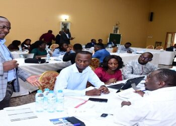 The Leader of the Opposition, Hon. Mpuuga interacts with MPs during the break away sessions at the retreat