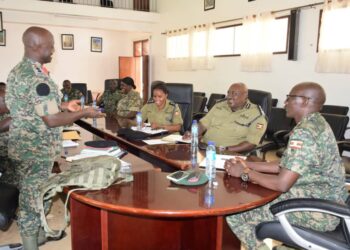 UPDF and Police officials in a meeting