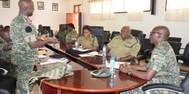 UPDF and Police officials in a meeting