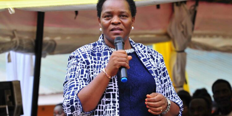 The Minister of State for Gender and Culture Peace Regis Mutuuzo delivering her remarks during the Presidential Initiative on skilling the Girl/Boy Child project 7th intake inspection of the skills of the students as they show case their work at Sub-way Centre on 23rd February 2023. Photo by PPU/Tony Rujuta.