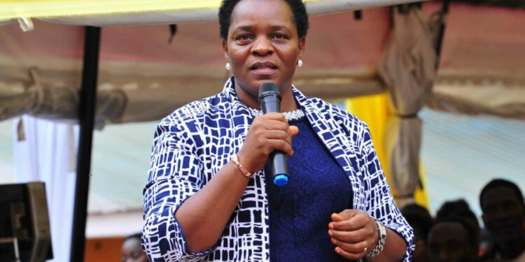 The Minister of State for Gender and Culture Peace Regis Mutuuzo
