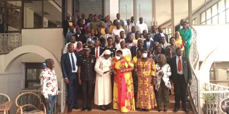 Minister Babalanda in a group photo with RDCs and RCCs from Central Buganda