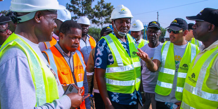 Hon. Otaala Emmanuel Otiam (centre) - MP West Budama, South County and Chair Person, Environment And Natural Resources Committee, together with Rikki Verma (2nd right) and other MPs and project stakeholders during the MPs’ visits.