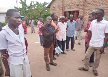 Greater Luwero ONC Coordinator Abdukarim Tamale with Bibanja Holders