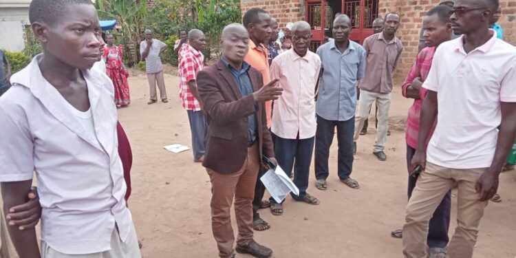 Greater Luwero ONC Coordinator Abdukarim Tamale with Bibanja Holders