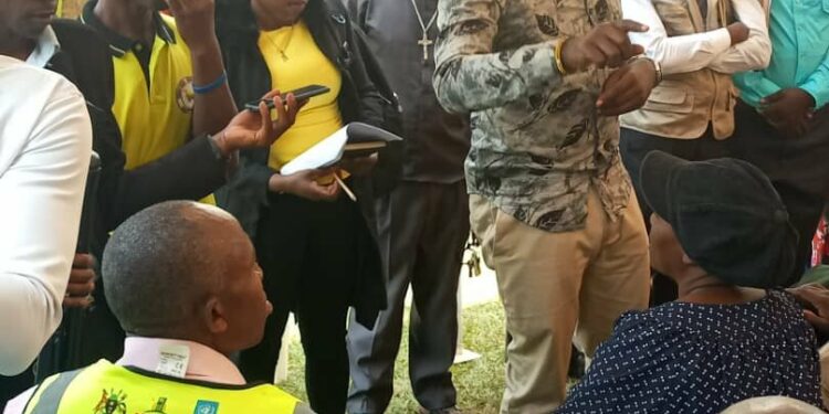 The Deputy RCC Rubaga Herbert Underson Burora while addressing the people of Rubaga at one of the NAADS meeting