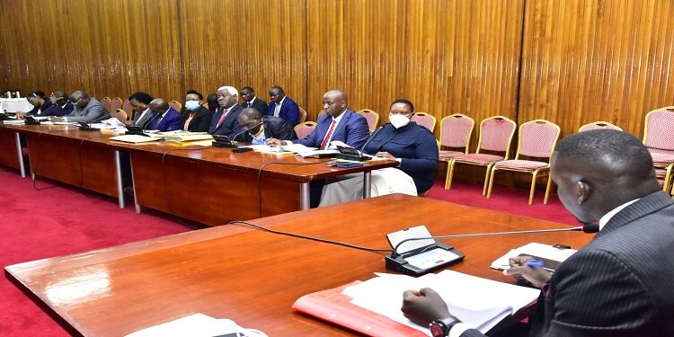 Hon. Babalanda (2nd R) appearing before Cosase chaired by Ssenyonyi (R)