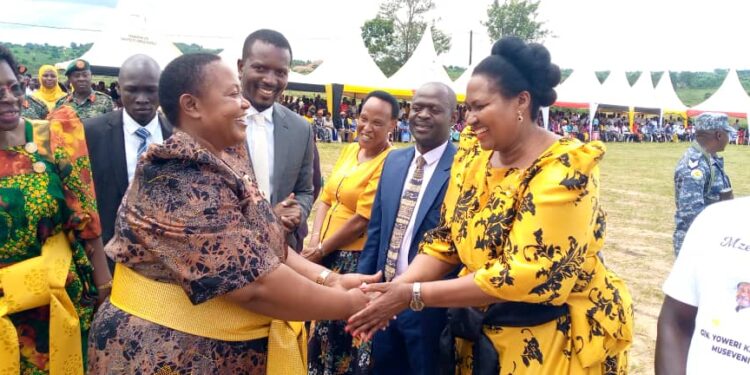 Minister Babalanda (left) during the 37th NRM Liberation Day Celebrations for Lwengo District